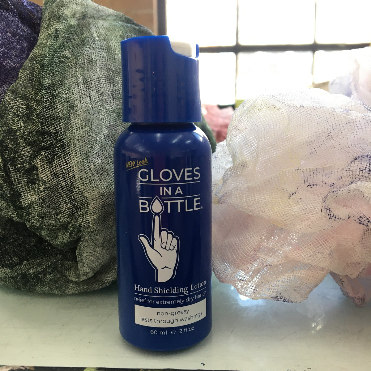 Gloves in a Bottle Shielding Lotion Travel Size – Crown Point Press  Bookstore